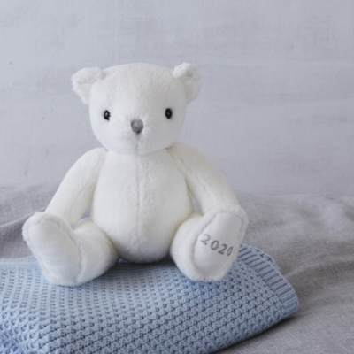 The white 2024 company teddy