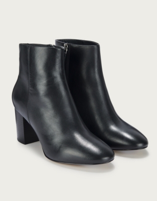 white leather block heel ankle boots