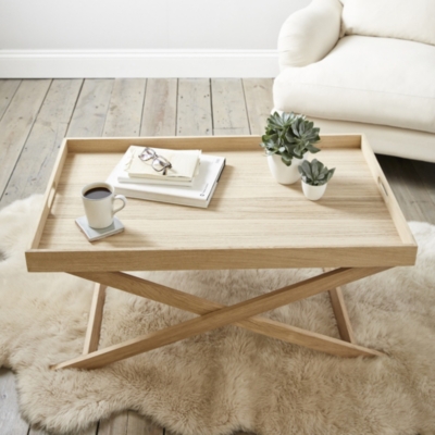 Tray Coffee Tables : Moorish Rectangular Brass Tray Coffee Table - This circular design is crafted from solid wood in a rustic brown hue and features a carved bottom.