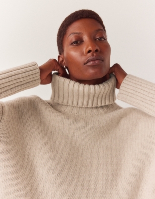 Chunky cream roll neck on sale jumper