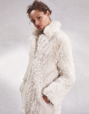 Curly hot sale shearling coat