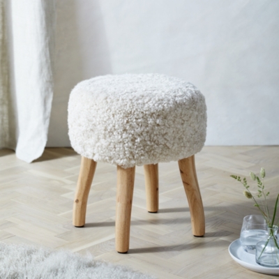 White sheepskin store stool