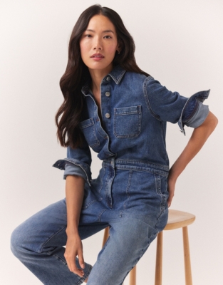 Premium Photo  Young woman in denim jumpsuit