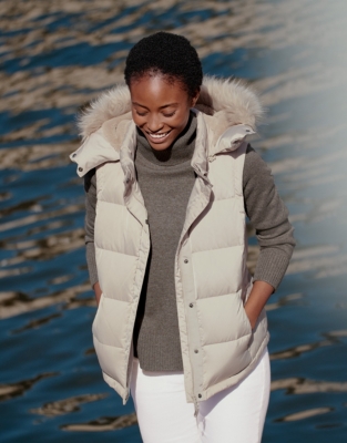 White gilet with store fur hood