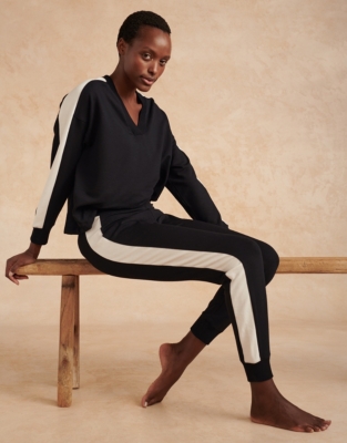 Black joggers with white stripe online womens