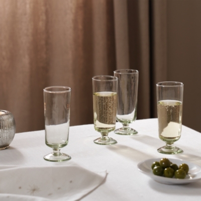 Four modern champagne flutes