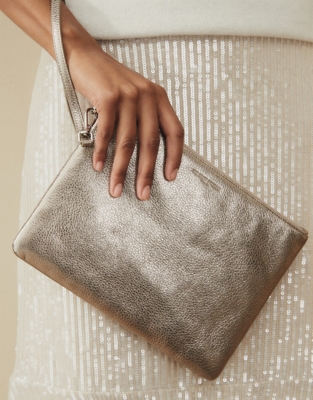 white wristlet clutch bag