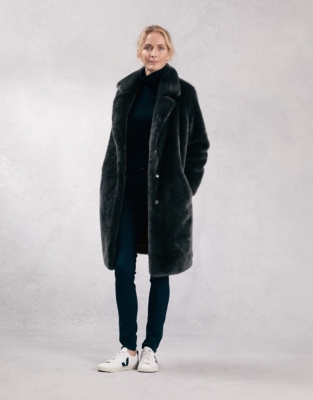 White company shop fur coat