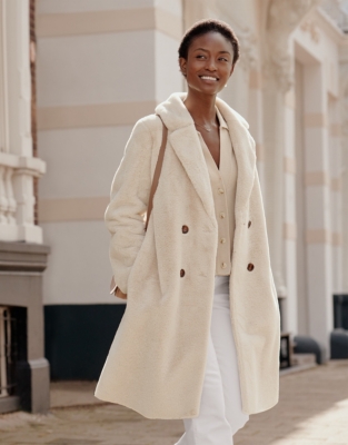 Long cream faux fur on sale coat