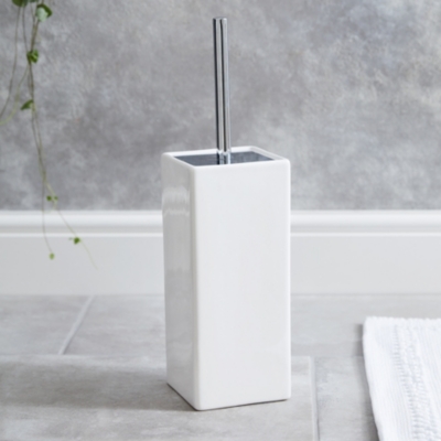 white porcelain toilet brush holder