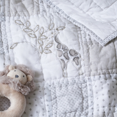 White baby shop quilt