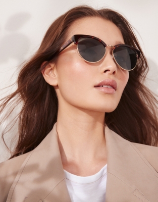 The white 2025 company sunglasses