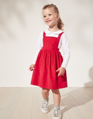 Red store cord pinafore