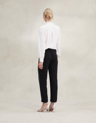 black trousers with silver side stripe