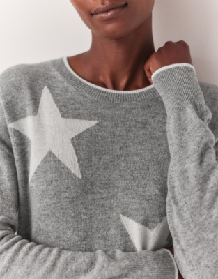 The white 2025 company star jumper