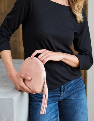 pale pink suede clutch bag