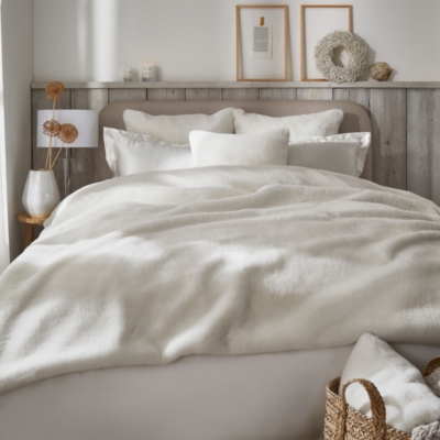 White company bed online throw