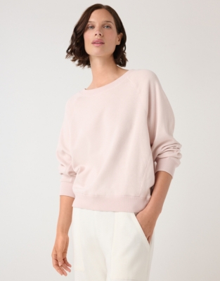 Pale pink sweatshirt on sale