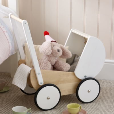 white wooden pram