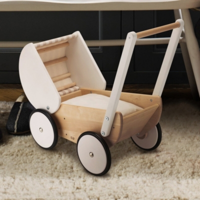 white wooden pram